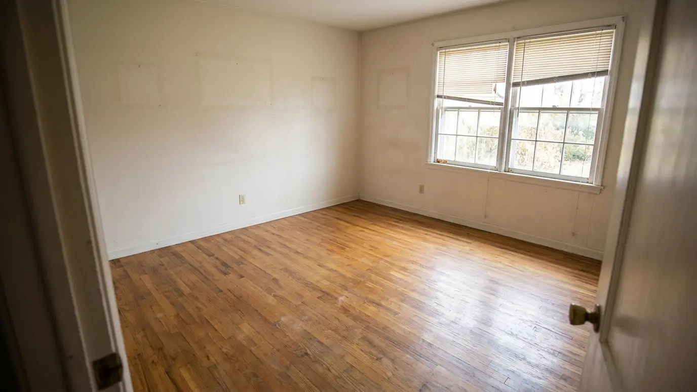 After: Move-out cleanout | Music City Junk After: a bedroom with an empty, swept room ready for handover